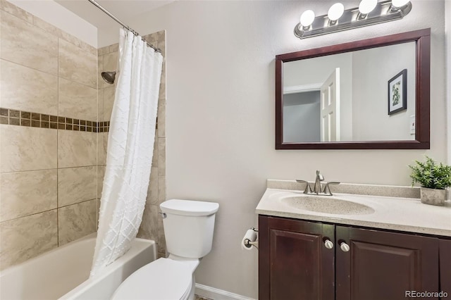 7792 Garrison Ct, Arvada, CO 80005 - bathroom with vanity, shower / tub combo with curtain, and toilet