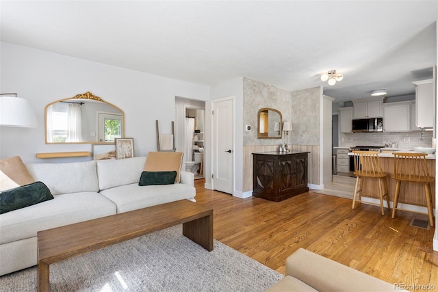 living room with light wood-type flooring