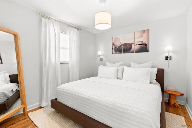 bedroom featuring hardwood / wood-style flooring