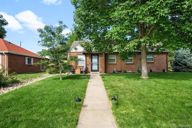 ranch-style house with a front lawn