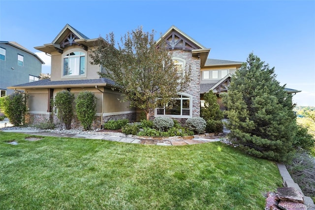 1159 Buffalo Ridge Rd, Castle Pines, CO 80108 - view of front facade with stone siding, stucco siding, and a front lawn