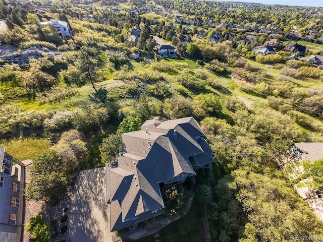 1159 Buffalo Ridge Rd, Castle Pines, CO 80108 - aerial overview of property's location with nearby suburban area
