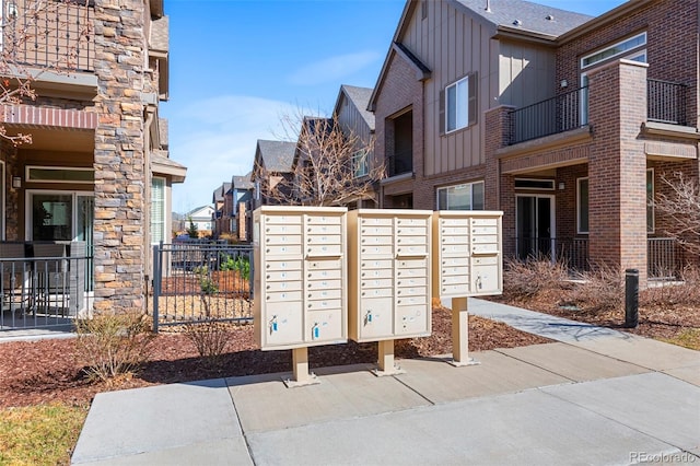 view of home's community with mail area