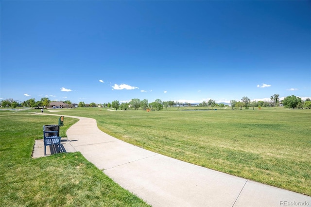 surrounding community with a lawn