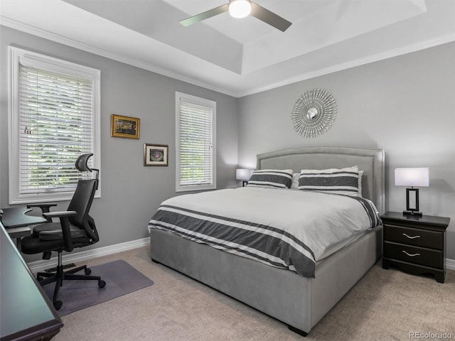 425 Steele St, Denver, CO 80206 - bedroom featuring a tray ceiling, carpet, multiple windows, a desk, and crown molding