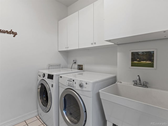 425 Steele St, Denver, CO 80206 - washroom with cabinet space, separate washer and dryer, and light tile patterned flooring
