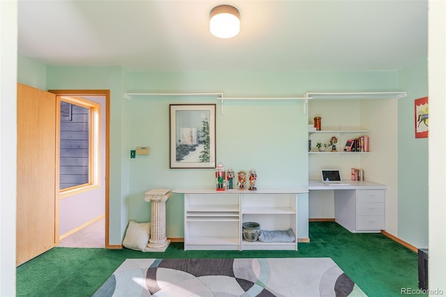 interior space featuring baseboards