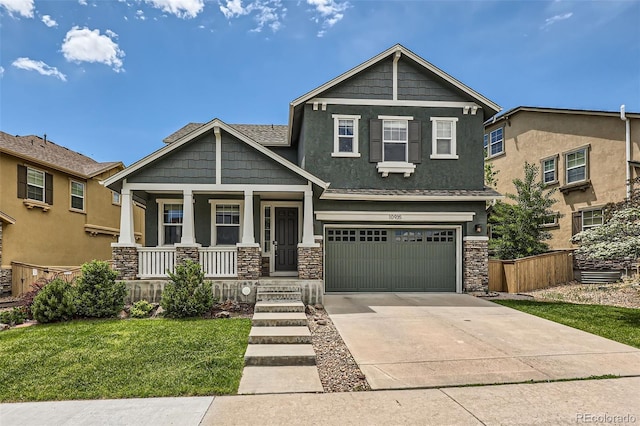 10935 Valleybrook Cir, Highlands Ranch, CO 80130 - craftsman-style home with covered porch, stone siding, concrete driveway, and an attached garage