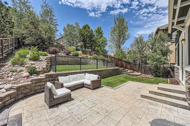 10935 Valleybrook Cir, Highlands Ranch, CO 80130 - fenced backyard with outdoor lounge area and a patio