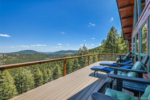 10268 Christopher Dr, Conifer, CO 80433 - deck featuring a mountain view and a forest view