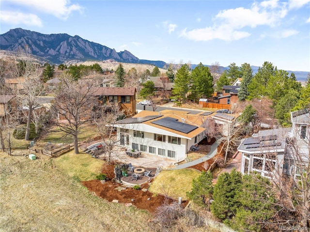 drone / aerial view featuring a mountain view