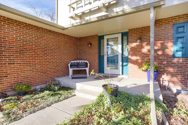 property entrance with covered porch