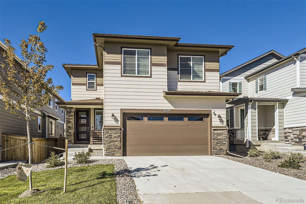 view of front of property with a garage