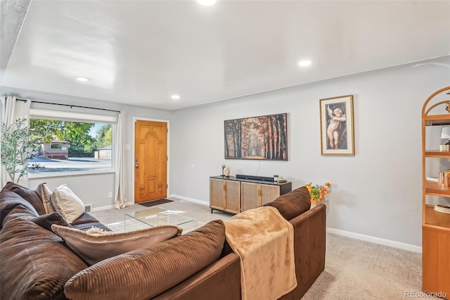 living room featuring light colored carpet