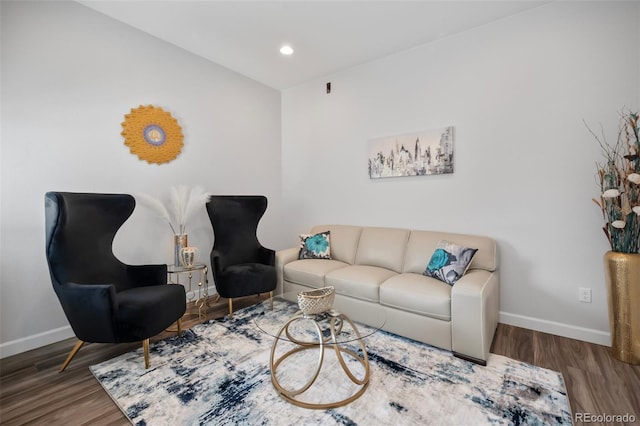 living room with baseboards, recessed lighting, and wood finished floors