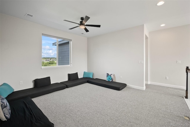 unfurnished living room featuring a ceiling fan, visible vents, carpet floors, baseboards, and recessed lighting