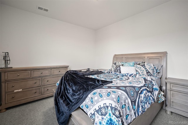 bedroom with visible vents and carpet floors