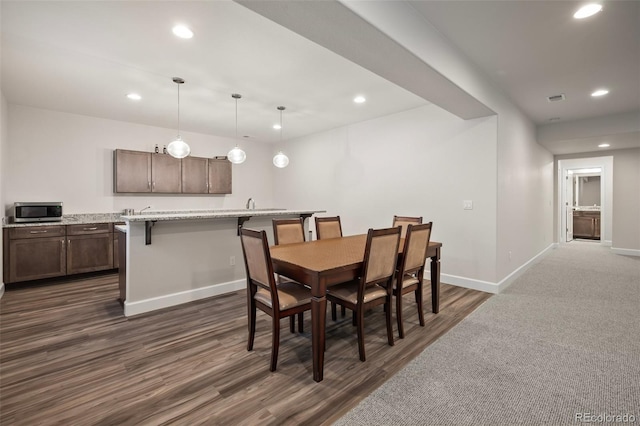 dining space featuring baseboards, visible vents, recessed lighting, and dark wood-type flooring