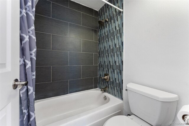 2 Adams St Unit 608, Denver, CO 80206 - bathroom with toilet and shower / tub combo with curtain