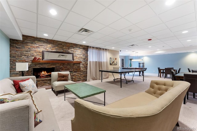 2 Adams St Unit 608, Denver, CO 80206 - carpeted living area with a paneled ceiling, a fireplace, and recessed lighting