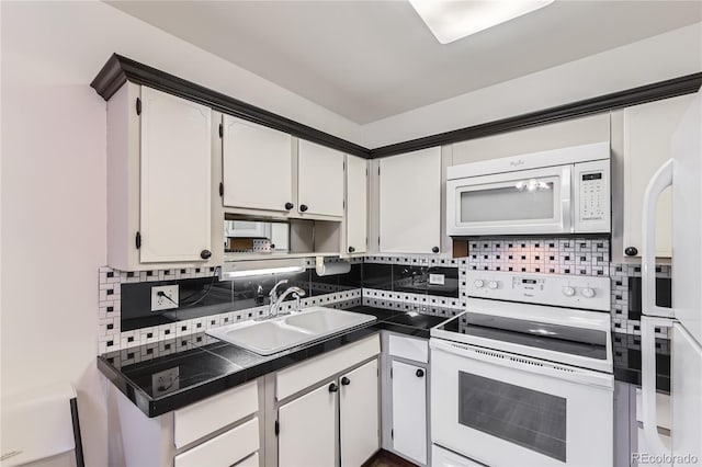 735 S Clinton St Unit 5B, Denver, CO 80247 - kitchen with white appliances, tasteful backsplash, and white cabinetry