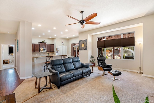 9709 Rockingham Dr, Peyton, CO 80831 - living room with a ceiling fan, baseboards, recessed lighting, and light colored carpet