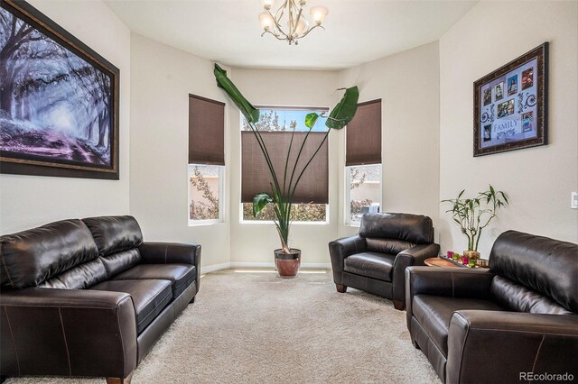 9709 Rockingham Dr, Peyton, CO 80831 - living area with carpet floors, a chandelier, and baseboards