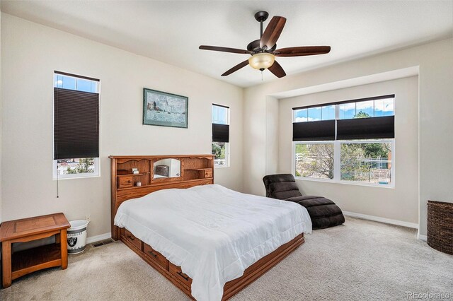 9709 Rockingham Dr, Peyton, CO 80831 - carpeted bedroom featuring baseboards and ceiling fan