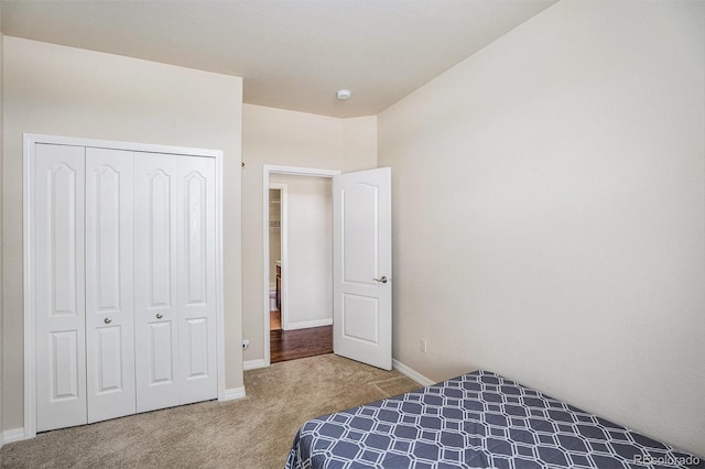 9709 Rockingham Dr, Peyton, CO 80831 - carpeted bedroom with a closet and baseboards