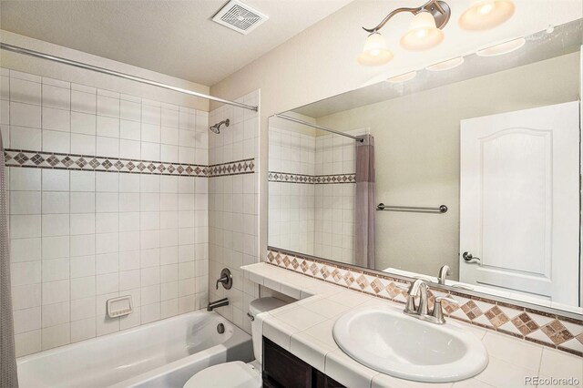 9709 Rockingham Dr, Peyton, CO 80831 - full bath featuring shower / bath combination with curtain, vanity, tasteful backsplash, and toilet