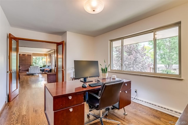 9650 W 35th Ave, Wheat Ridge, CO 80033 - office area featuring baseboard heating, light wood-style flooring, and french doors