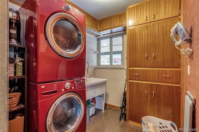 9650 W 35th Ave, Wheat Ridge, CO 80033 - washroom with stacked washer / dryer and baseboards