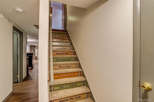 9650 W 35th Ave, Wheat Ridge, CO 80033 - staircase with wood finished floors and baseboards