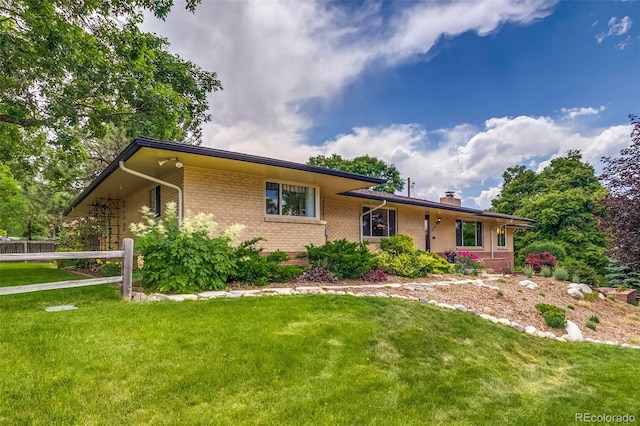 9650 W 35th Ave, Wheat Ridge, CO 80033 - view of front of property with brick siding and a chimney