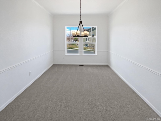23559 Branston Ln, Parker, CO 80138 - unfurnished dining area with baseboards, a notable chandelier, ornamental molding, and carpet