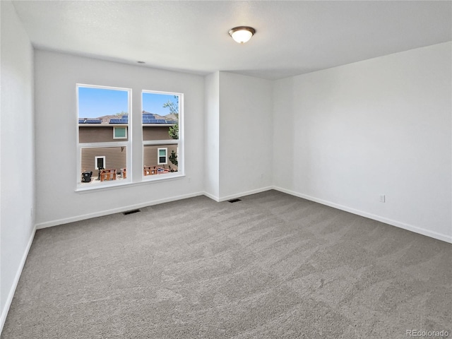 23559 Branston Ln, Parker, CO 80138 - empty room featuring carpet floors, baseboards, and visible vents