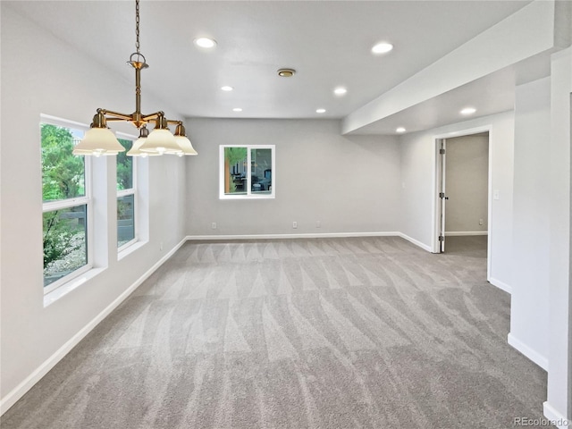 23559 Branston Ln, Parker, CO 80138 - carpeted empty room featuring baseboards, recessed lighting, and a wealth of natural light
