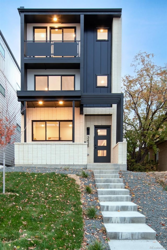 contemporary house featuring a balcony