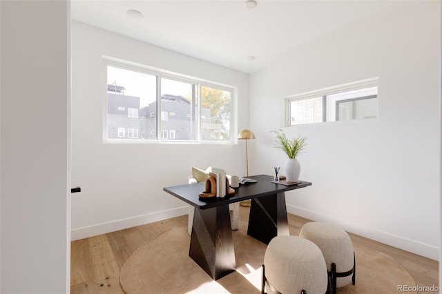 office area with light hardwood / wood-style flooring