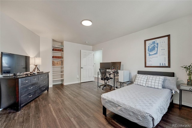 3035 Blodgett Dr, Colorado Springs, CO 80919 - bedroom featuring dark wood-type flooring and baseboards