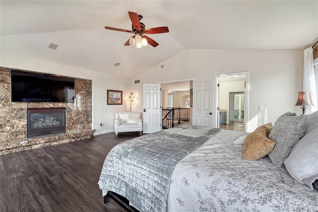 3035 Blodgett Dr, Colorado Springs, CO 80919 - bedroom featuring vaulted ceiling, visible vents, ceiling fan, a high end fireplace, and wood finished floors