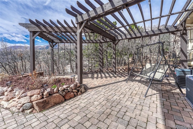 3035 Blodgett Dr, Colorado Springs, CO 80919 - view of patio / terrace featuring a mountain view and a pergola
