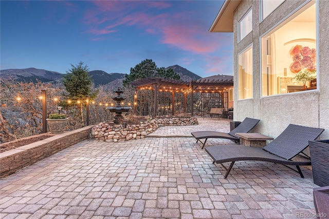 3035 Blodgett Dr, Colorado Springs, CO 80919 - view of patio / terrace featuring a pergola and a mountain view