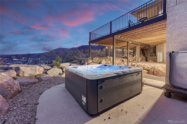 3035 Blodgett Dr, Colorado Springs, CO 80919 - view of patio with a mountain view and a hot tub