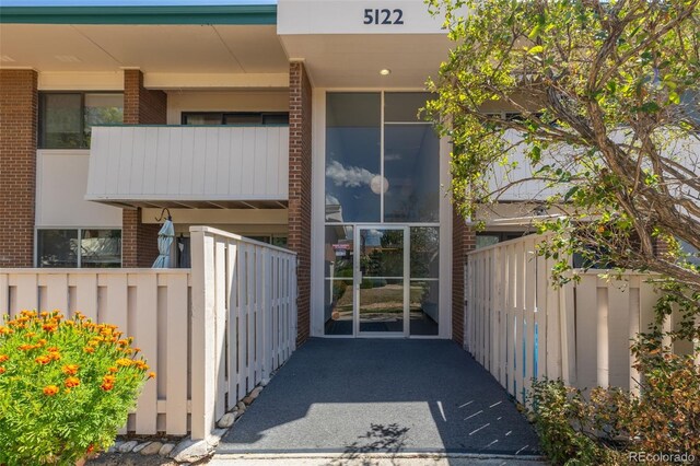 doorway to property with a balcony