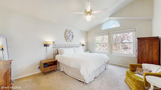 bedroom featuring light carpet, baseboards, lofted ceiling, and ceiling fan