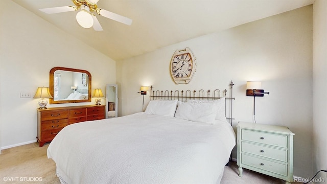 bedroom with light carpet, lofted ceiling, ceiling fan, and baseboards