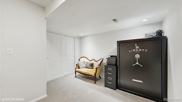 sitting room featuring carpet floors, baseboards, and recessed lighting