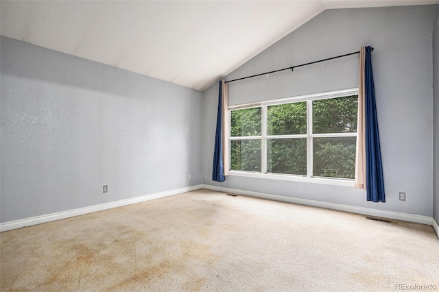 2786 S Cathay Way, Aurora, CO 80013 - carpeted spare room with vaulted ceiling and baseboards