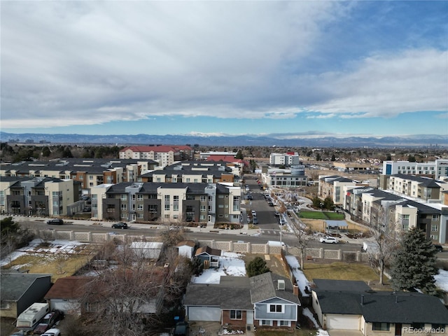 birds eye view of property featuring a mountain view